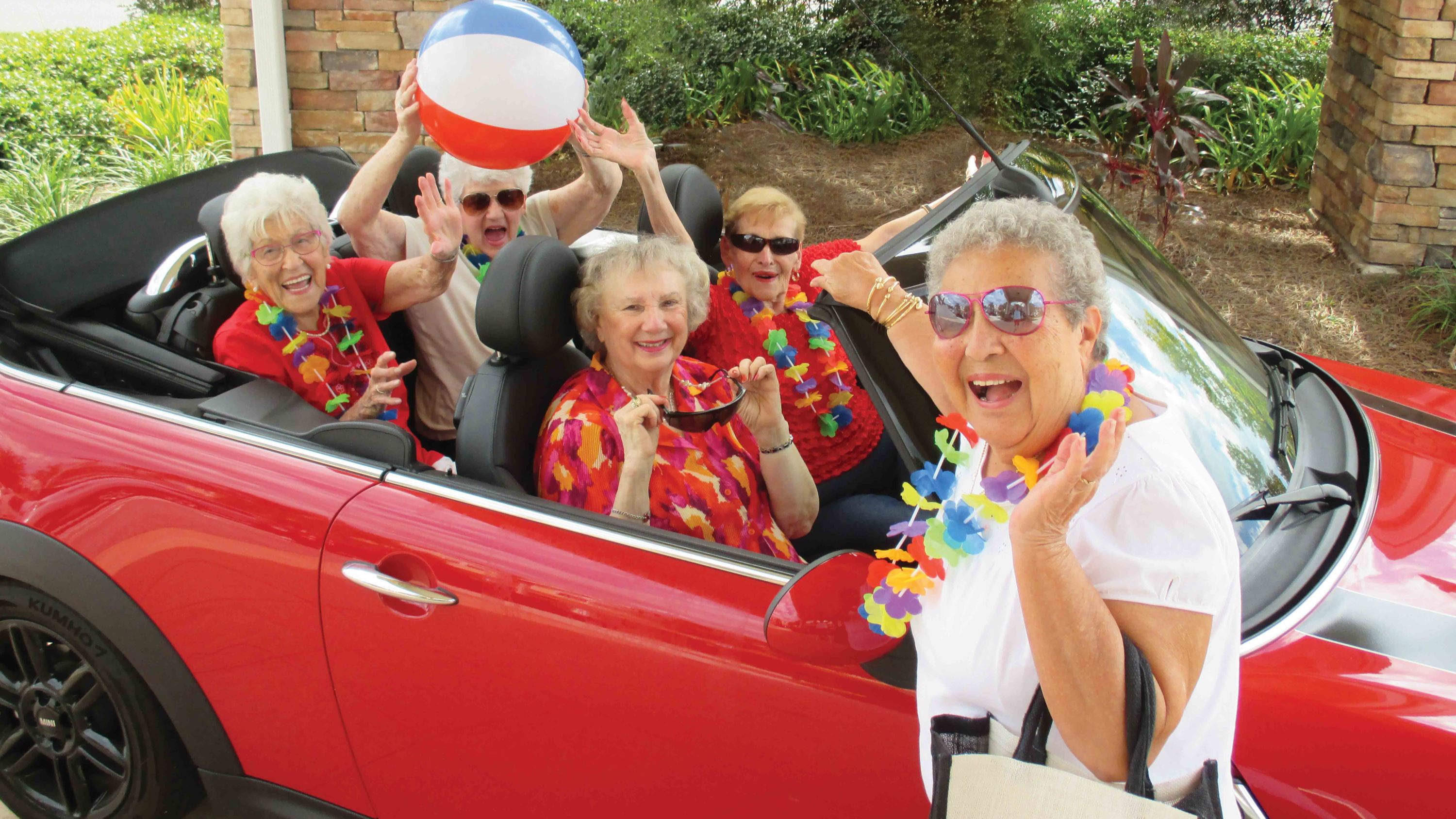 El Dorado Estates-Women-In-Red-Car
