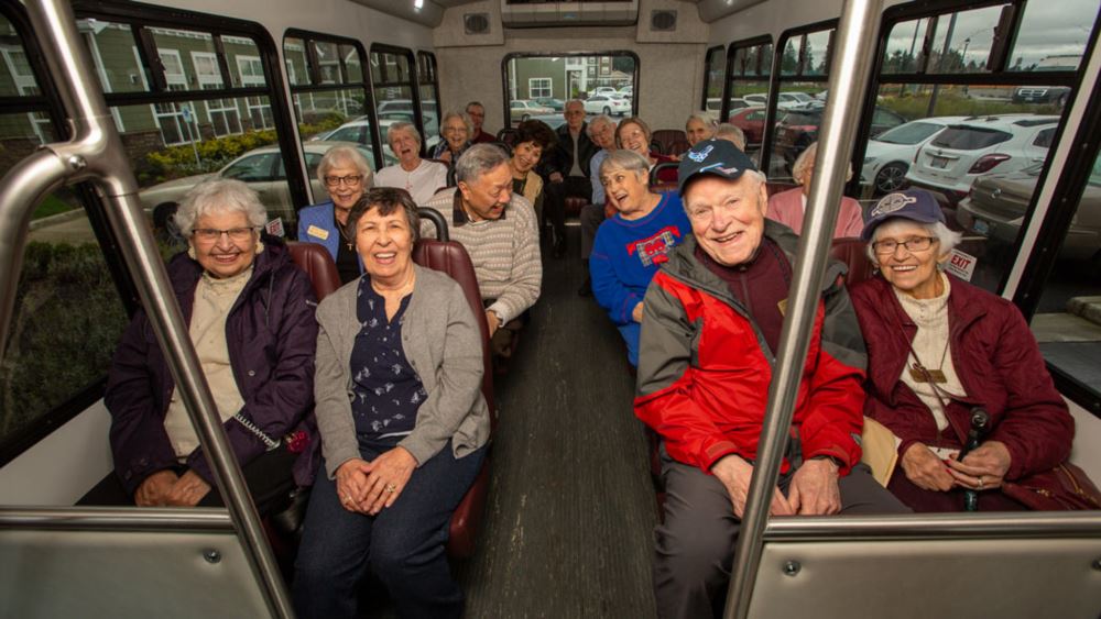 El Dorado Estates happy seniors on a bus.